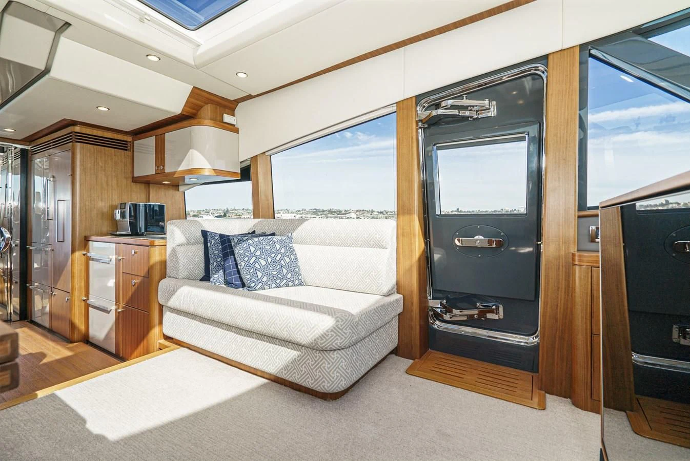 a room with a couch and a tv aboard VALENCIA Yacht for Sale