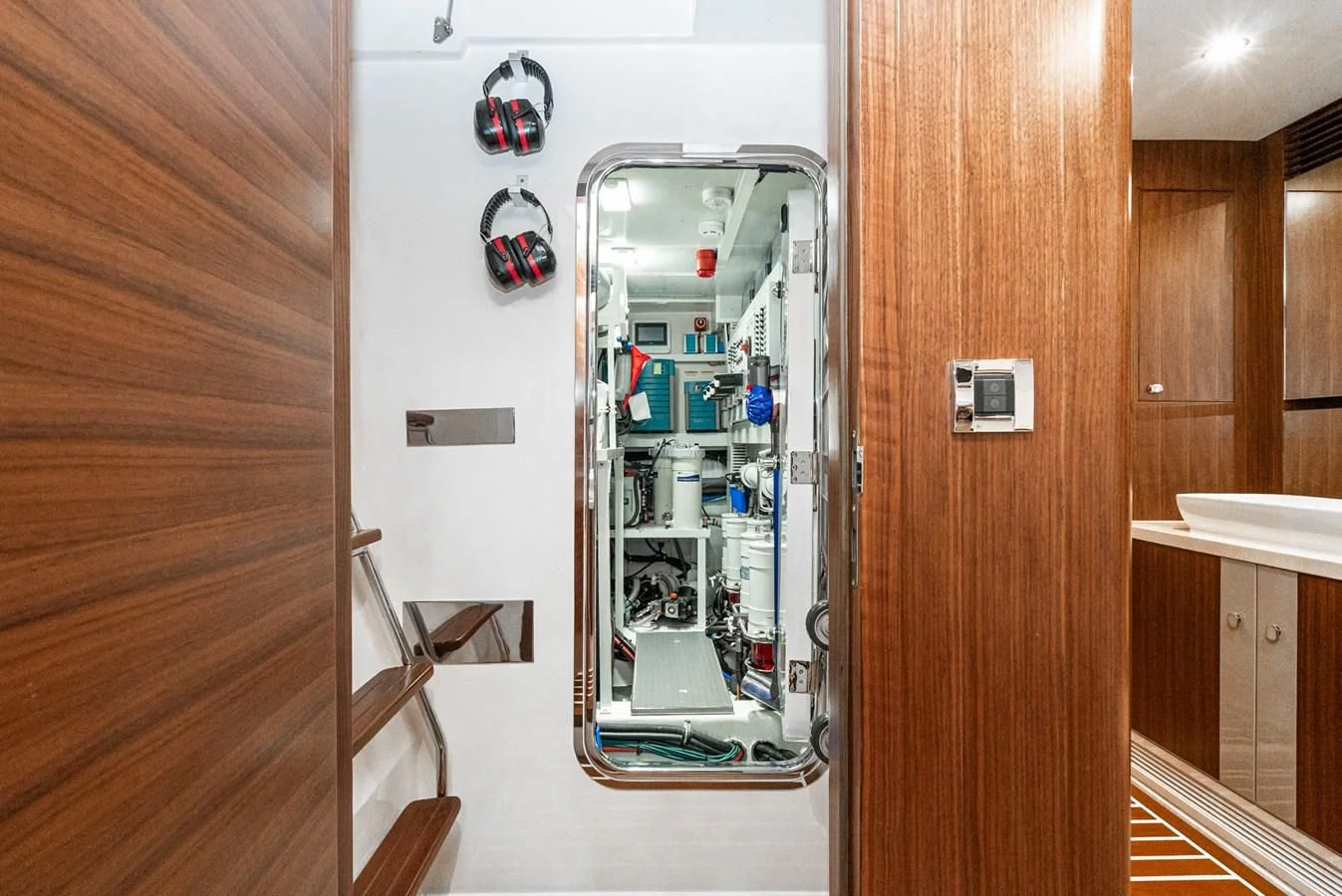 a glass cabinet with a shelf aboard VALENCIA Yacht for Sale