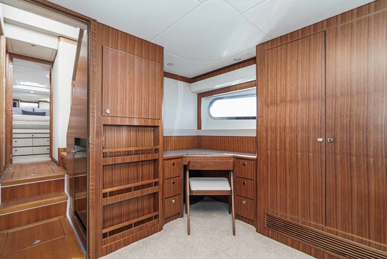 a room with wooden cabinets aboard VALENCIA Yacht for Sale