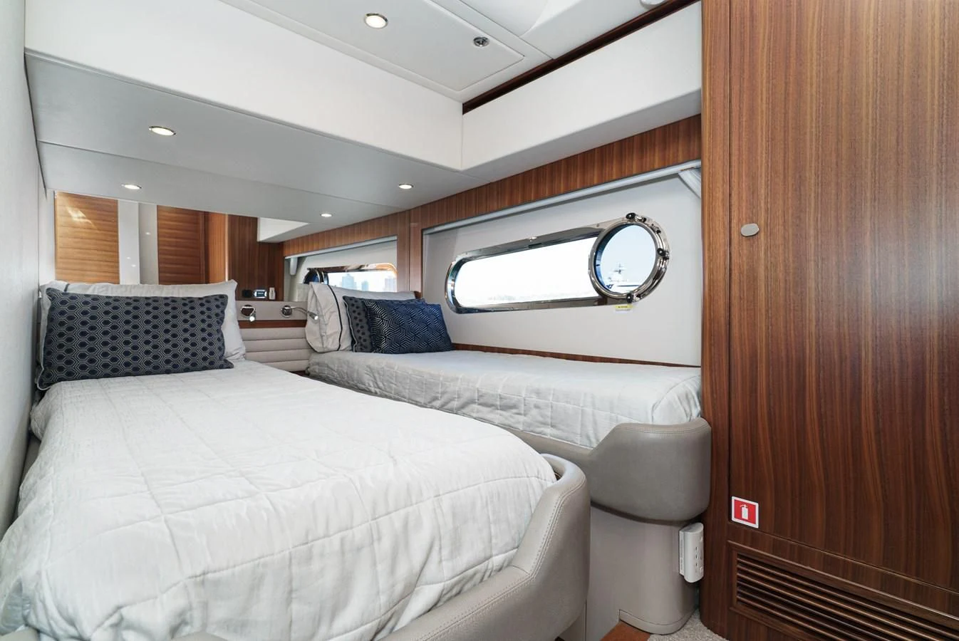 a room with a bed and a window aboard VALENCIA Yacht for Sale