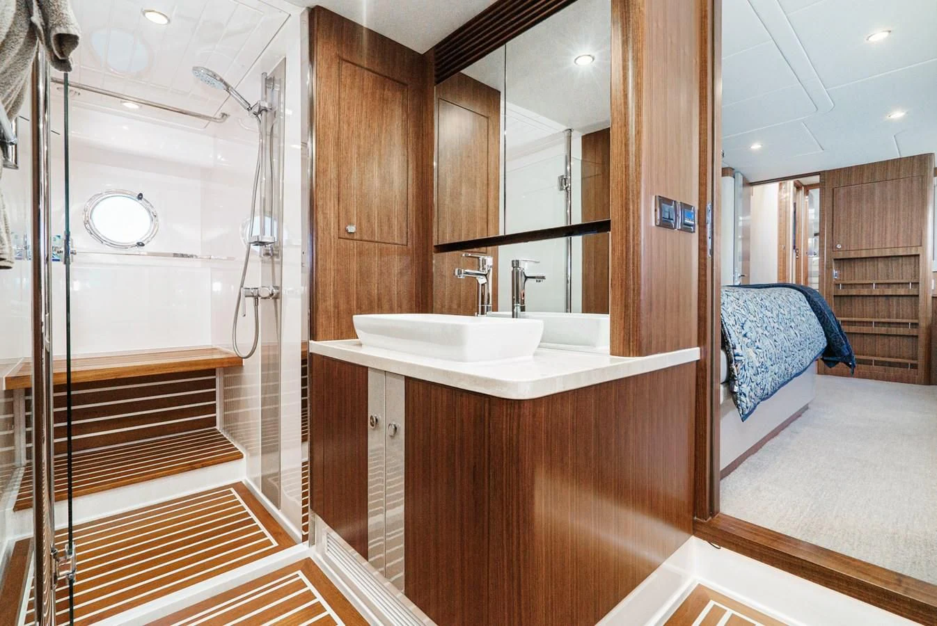 a bathroom with a sink and a shower aboard VALENCIA Yacht for Sale