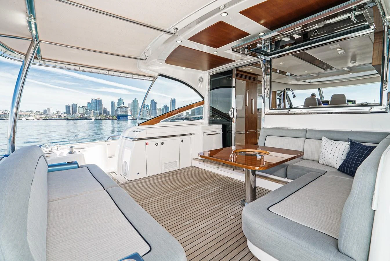 a boat with a table and chairs aboard VALENCIA Yacht for Sale
