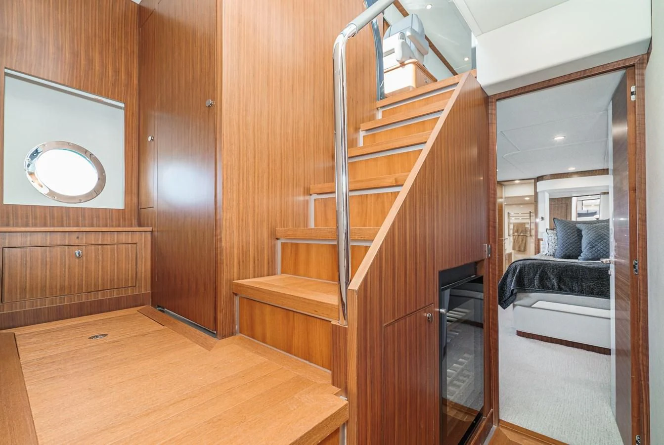 a room with a bed and a door aboard VALENCIA Yacht for Sale