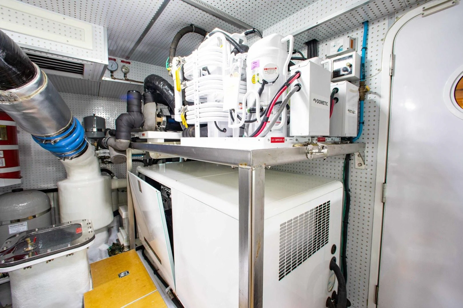 a machine with a white object on the side aboard ON LIBERTY Yacht for Sale