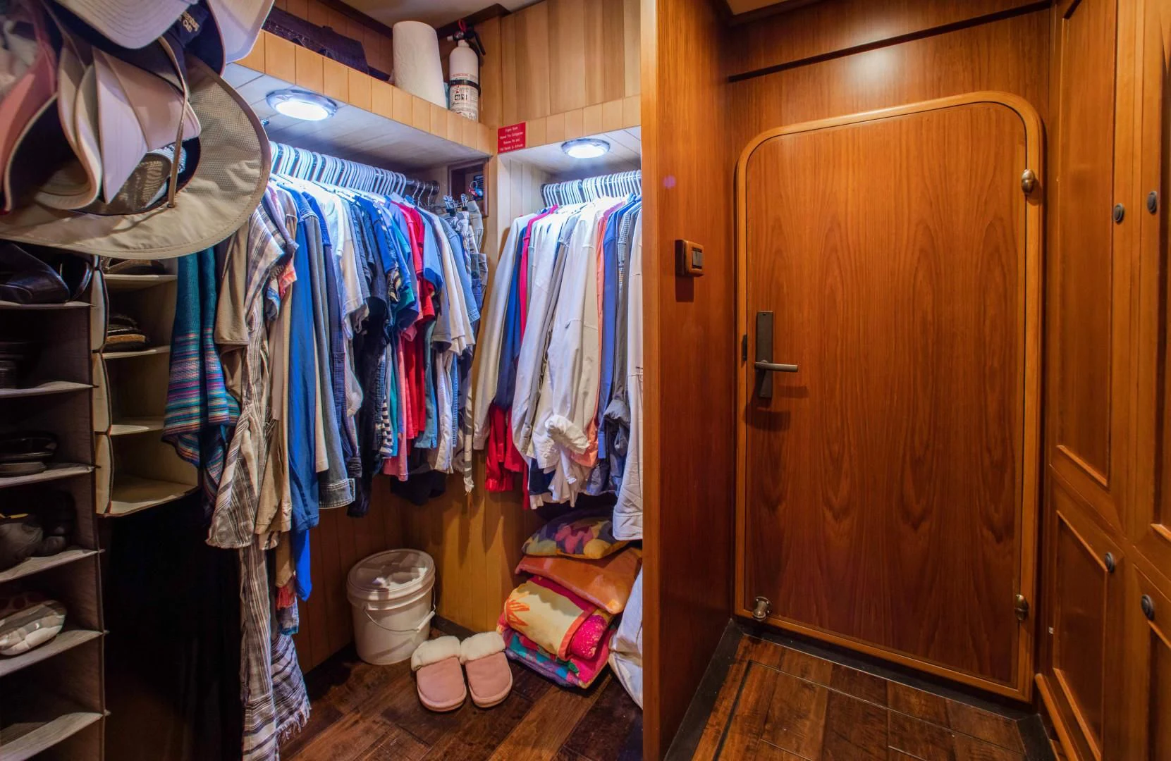 a closet full of clothes aboard ON LIBERTY Yacht for Sale