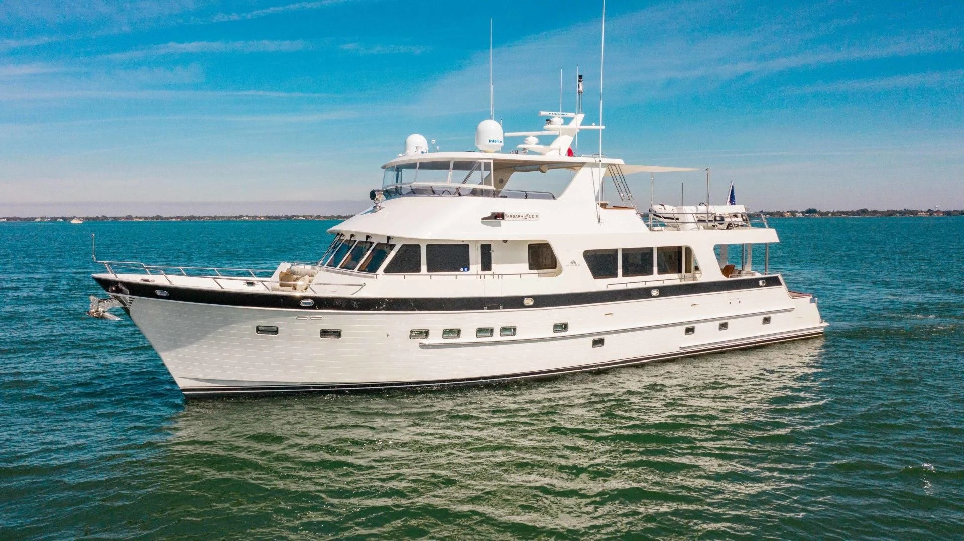 a white boat in the water aboard ON LIBERTY Yacht for Sale