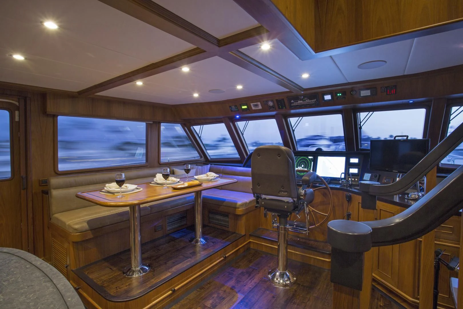 inside of a vehicle with a table and chairs and a large window aboard ON LIBERTY Yacht for Sale