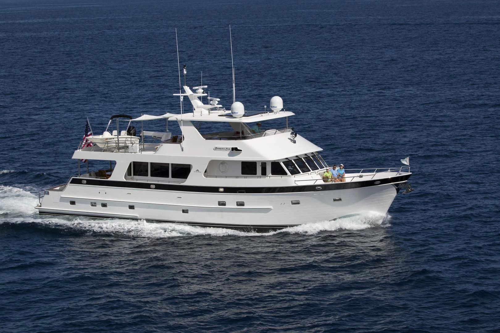 a white yacht in the water aboard ON LIBERTY Yacht for Sale