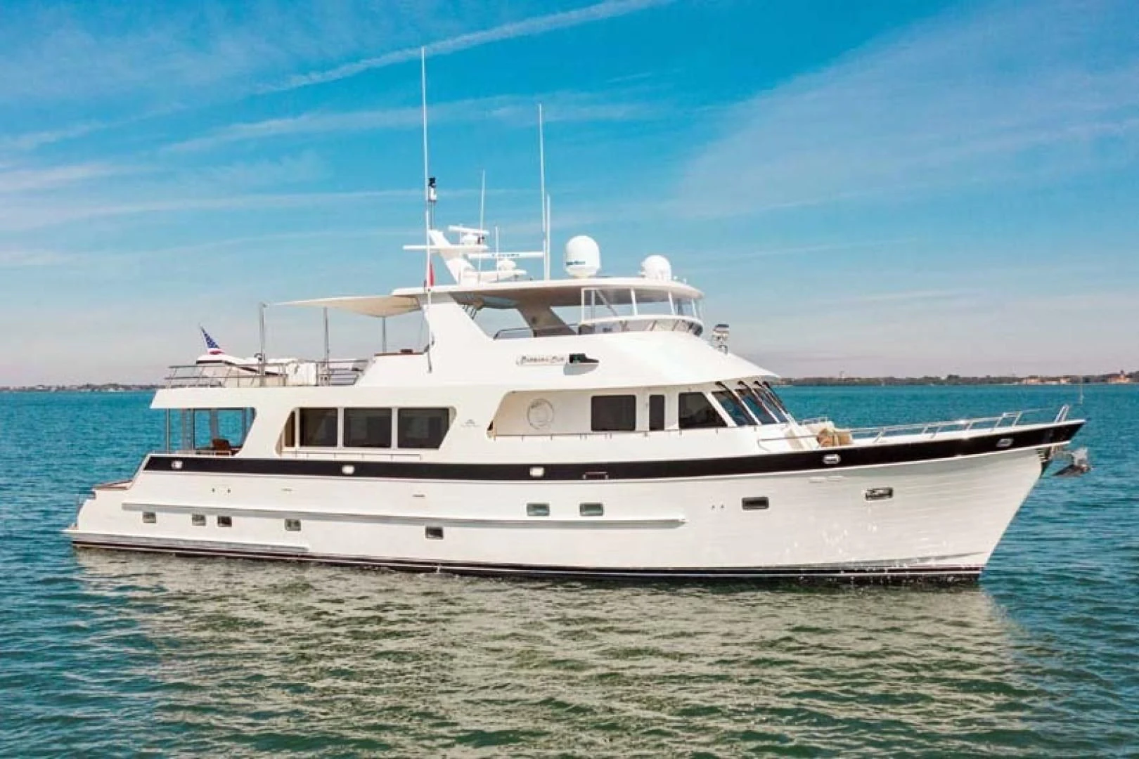 a white boat in the water aboard ON LIBERTY Yacht for Sale
