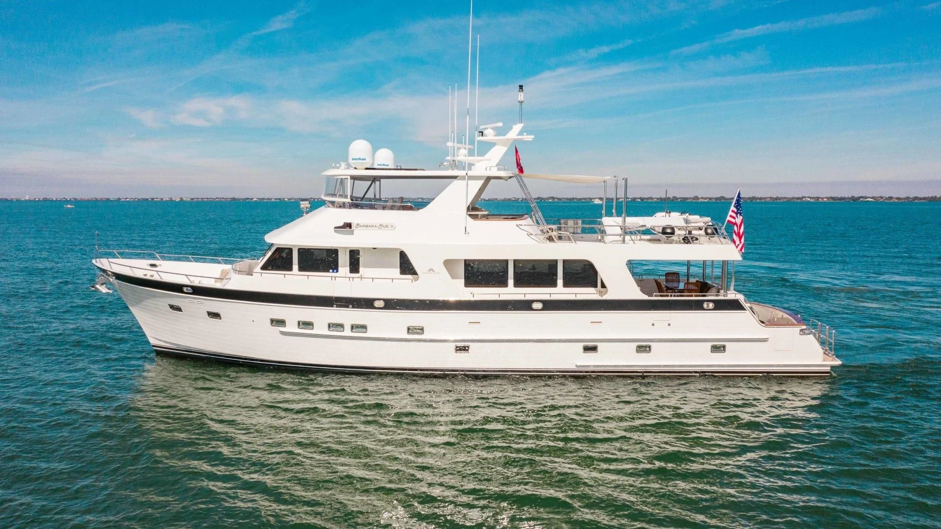 a white yacht in the water aboard ON LIBERTY Yacht for Sale