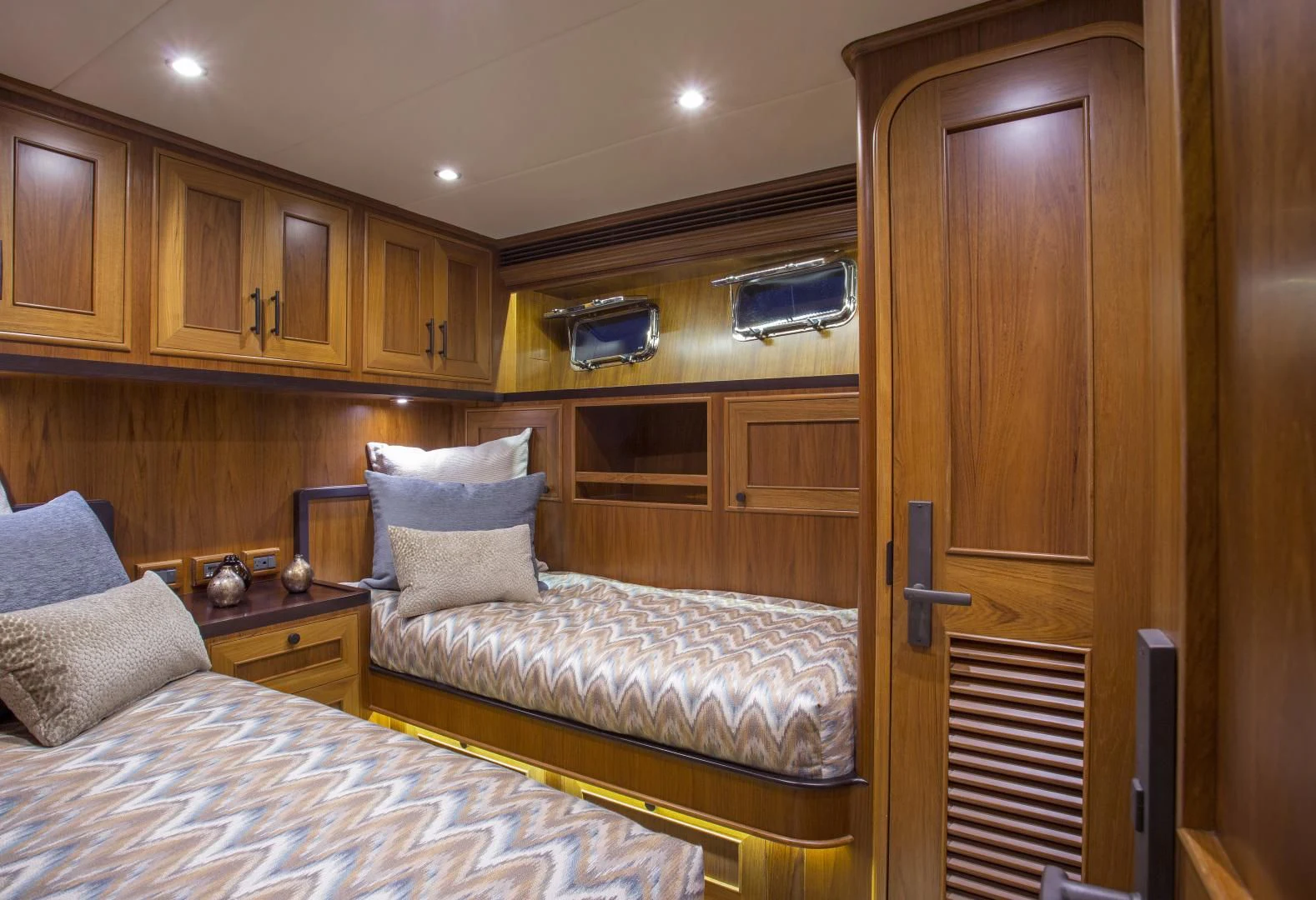 a bedroom with two beds aboard ON LIBERTY Yacht for Sale