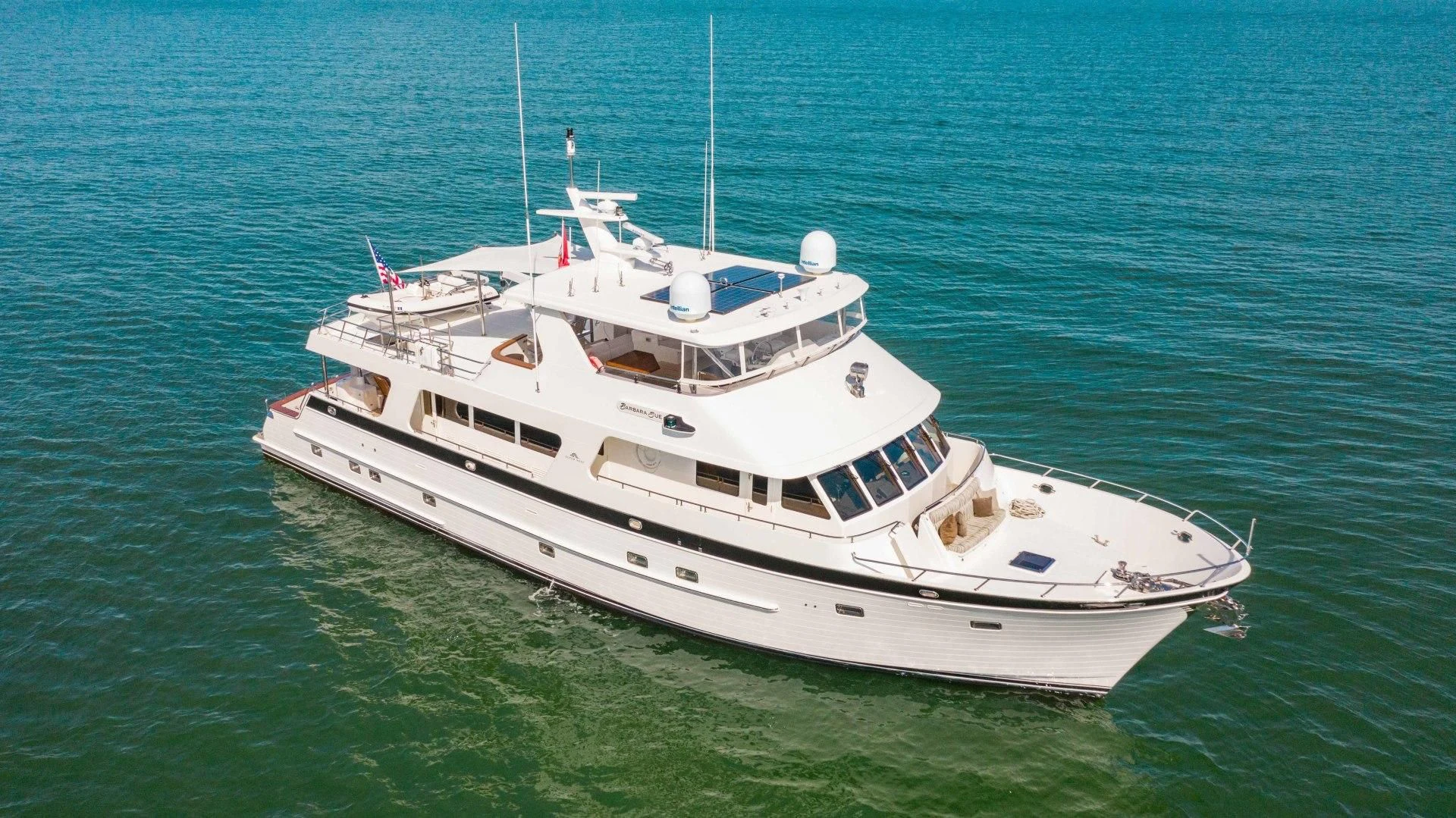 a white boat in the water aboard ON LIBERTY Yacht for Sale