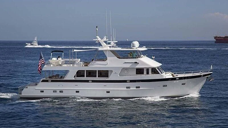 a white yacht in the water aboard ON LIBERTY Yacht for Sale