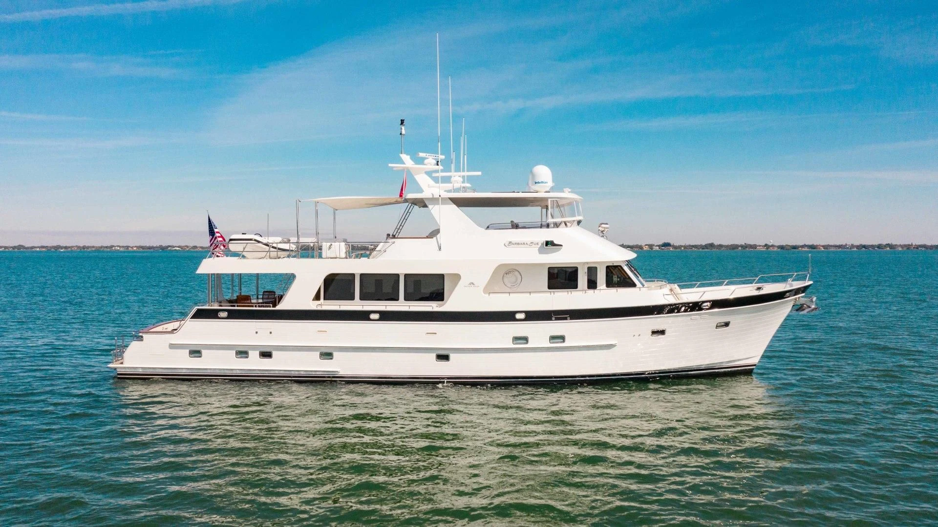 a white boat in the water aboard ON LIBERTY Yacht for Sale