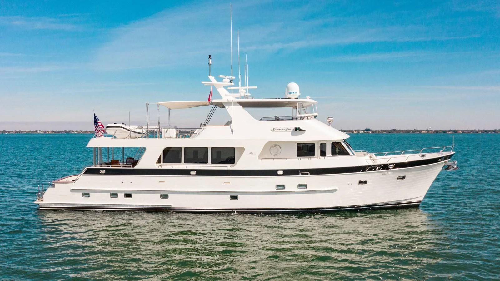 a white boat in the water aboard ON LIBERTY Yacht for Sale