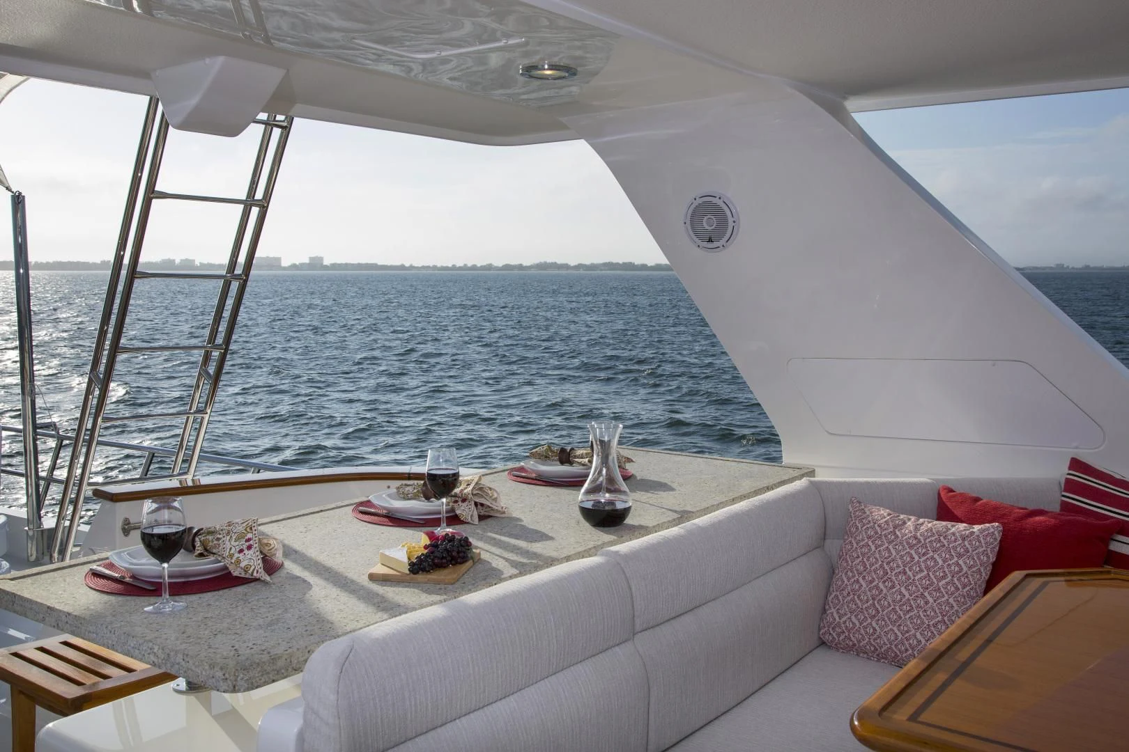 a boat with a table and chairs on the deck aboard ON LIBERTY Yacht for Sale