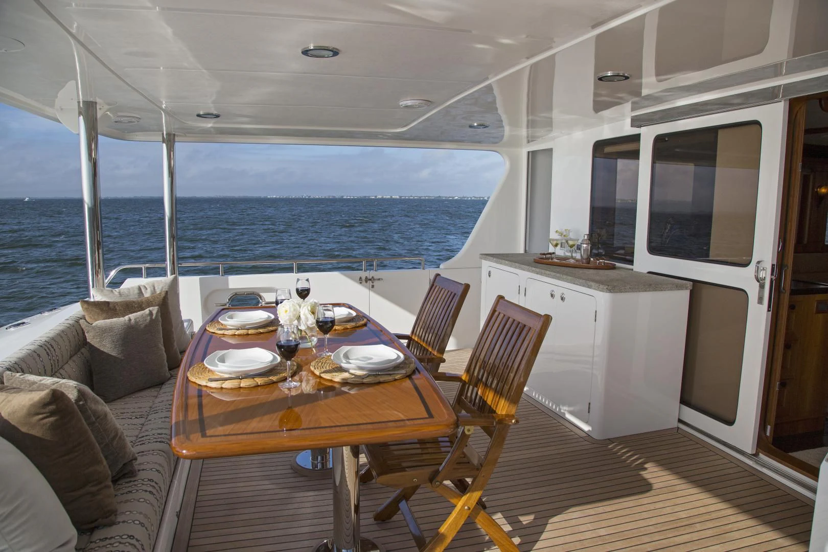 a dining table on a boat aboard ON LIBERTY Yacht for Sale