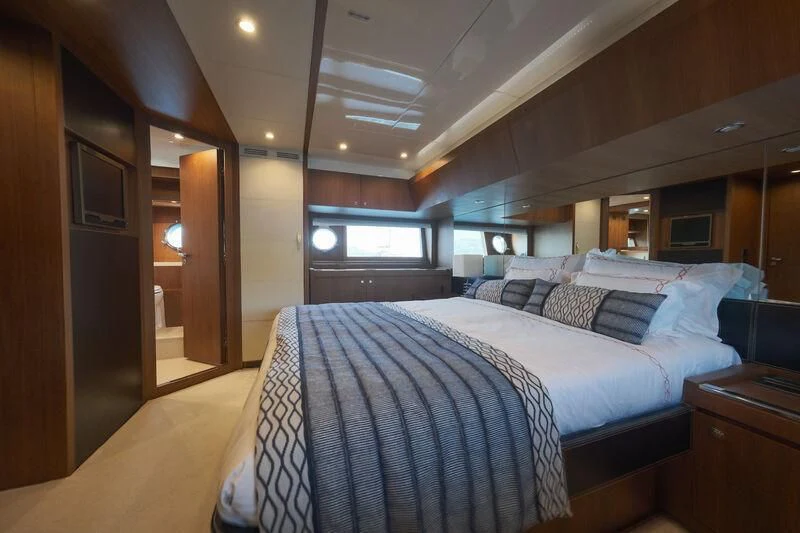 a bed in a room aboard REFLECT Yacht for Sale