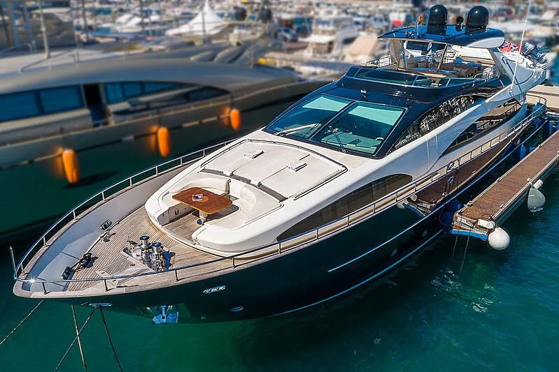 a boat docked at a pier aboard REFLECT Yacht for Sale