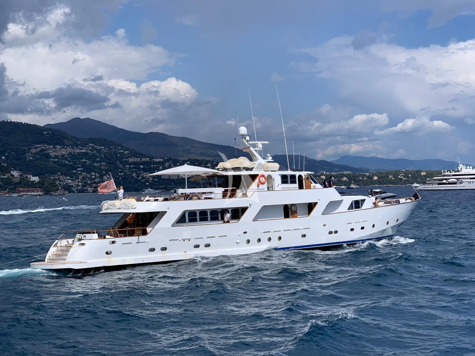 a white yacht on the water aboard AVA Yacht for Charter