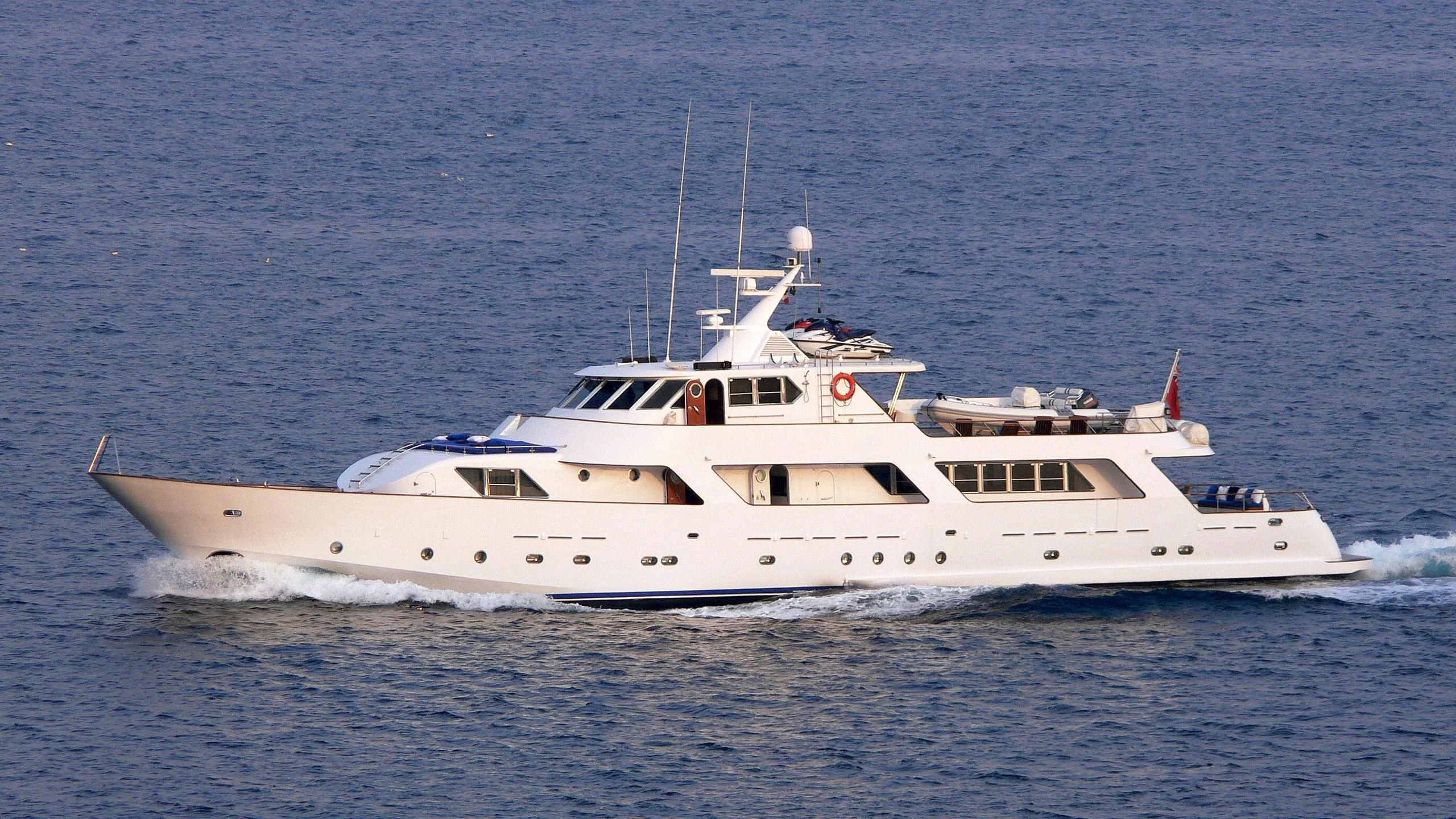 a white yacht in the water aboard AVA Yacht for Charter