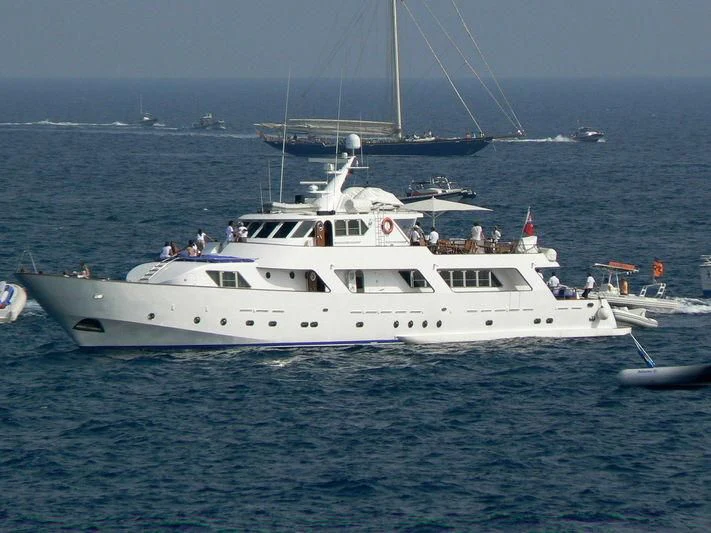 a white boat in the water aboard AVA Yacht for Charter