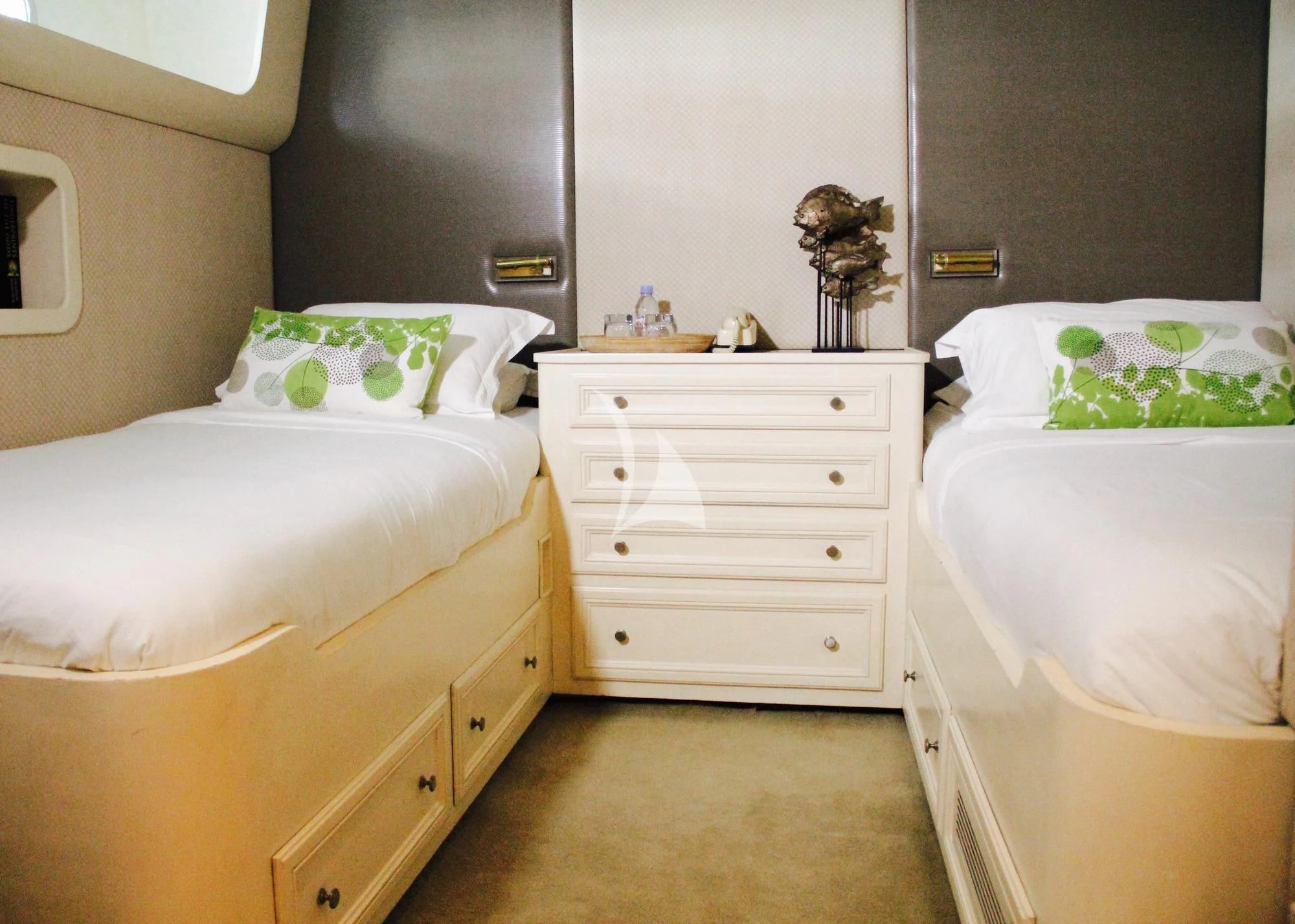 a room with two beds aboard AVA Yacht for Charter
