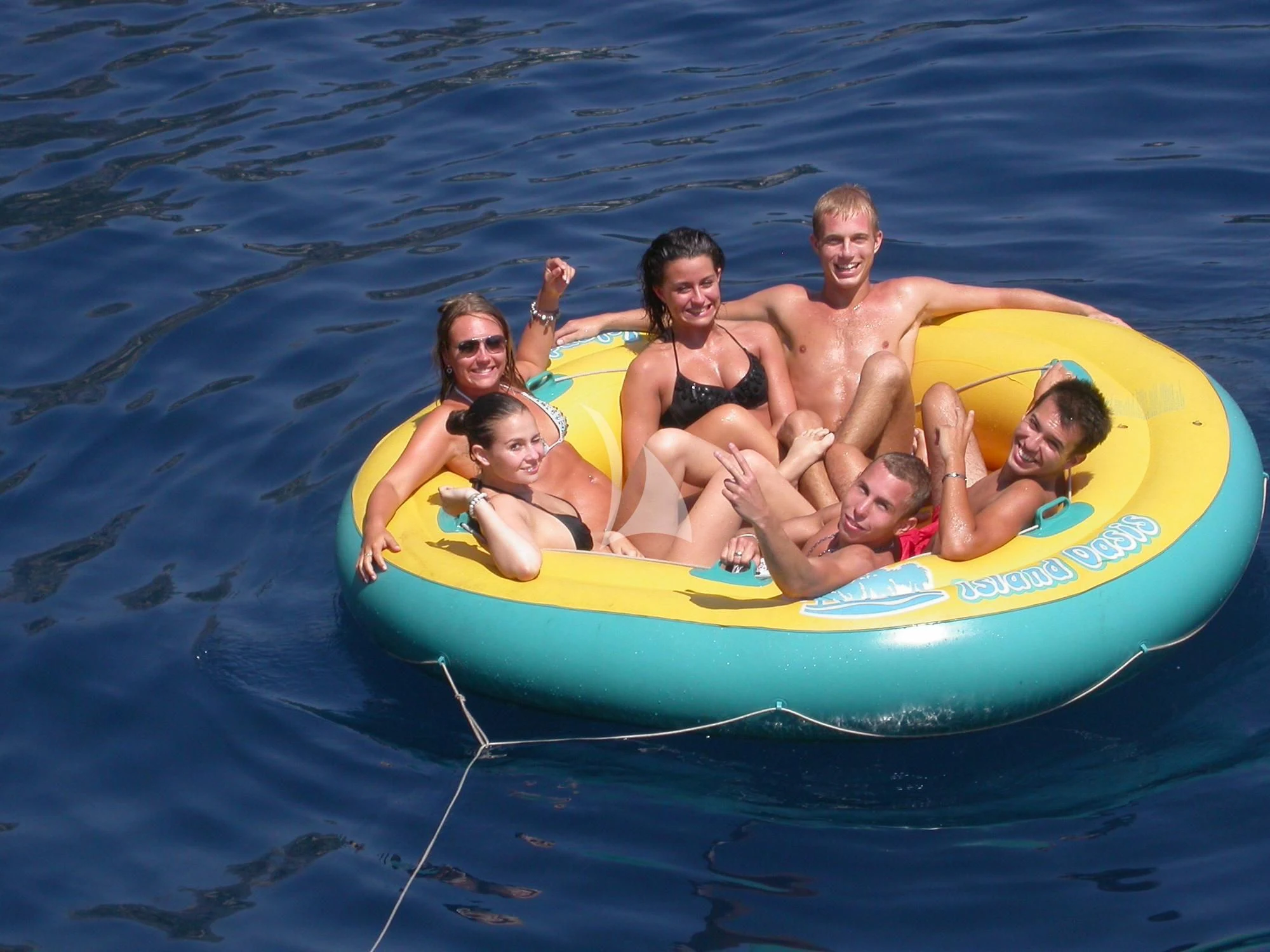 a group of people in a raft aboard AVA Yacht for Charter