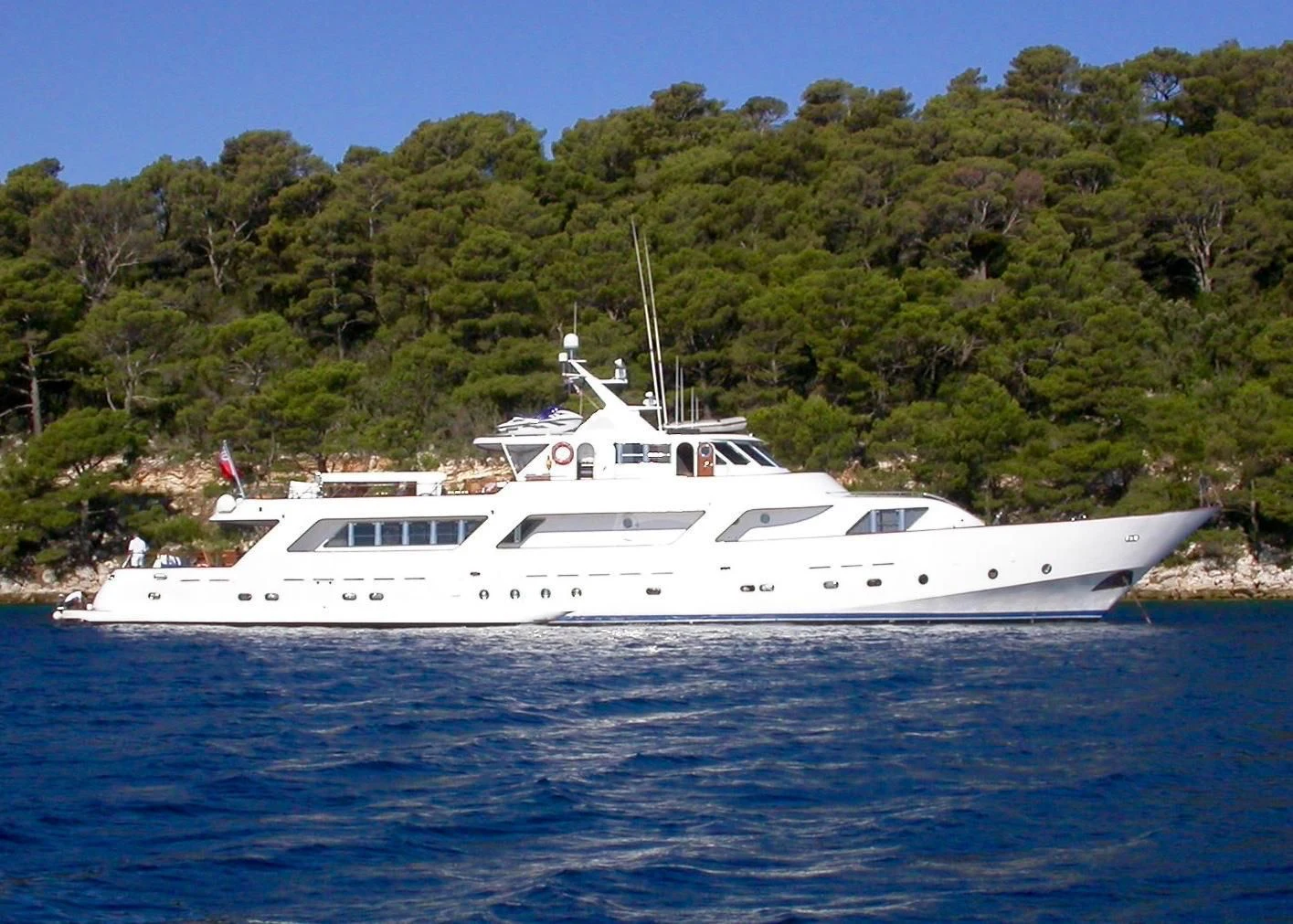 a white boat on the water aboard AVA Yacht for Charter