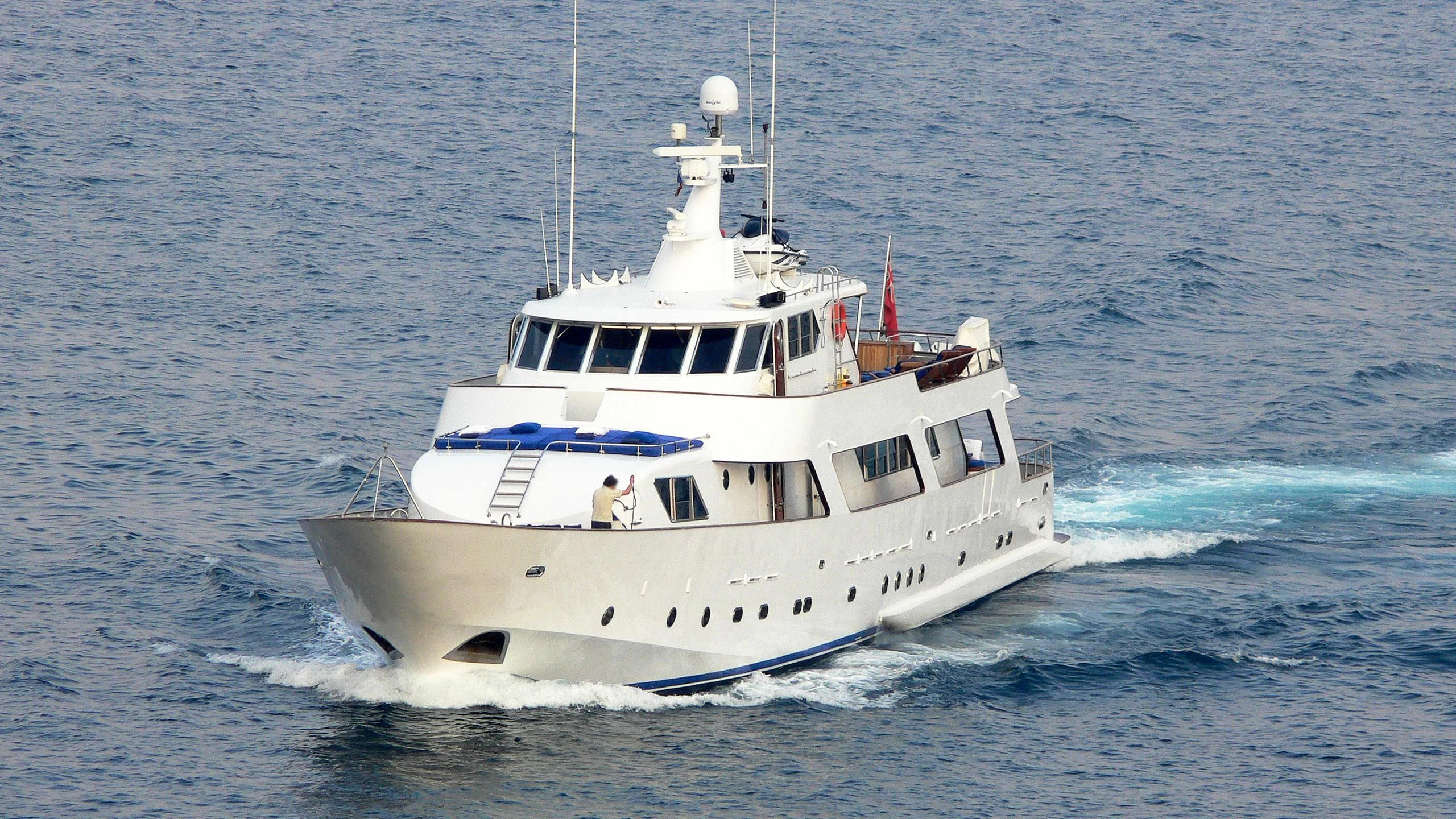 a white boat on the water aboard AVA Yacht for Charter
