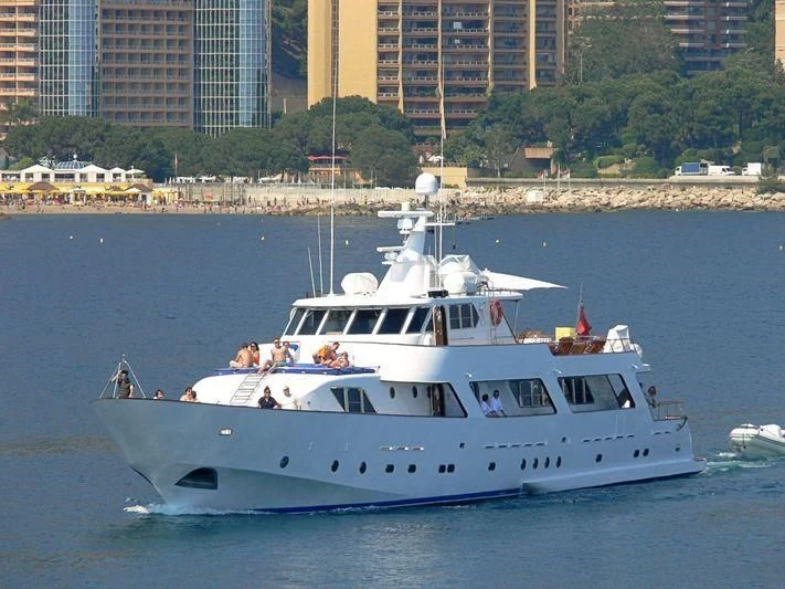 a white boat on the water aboard AVA Yacht for Charter