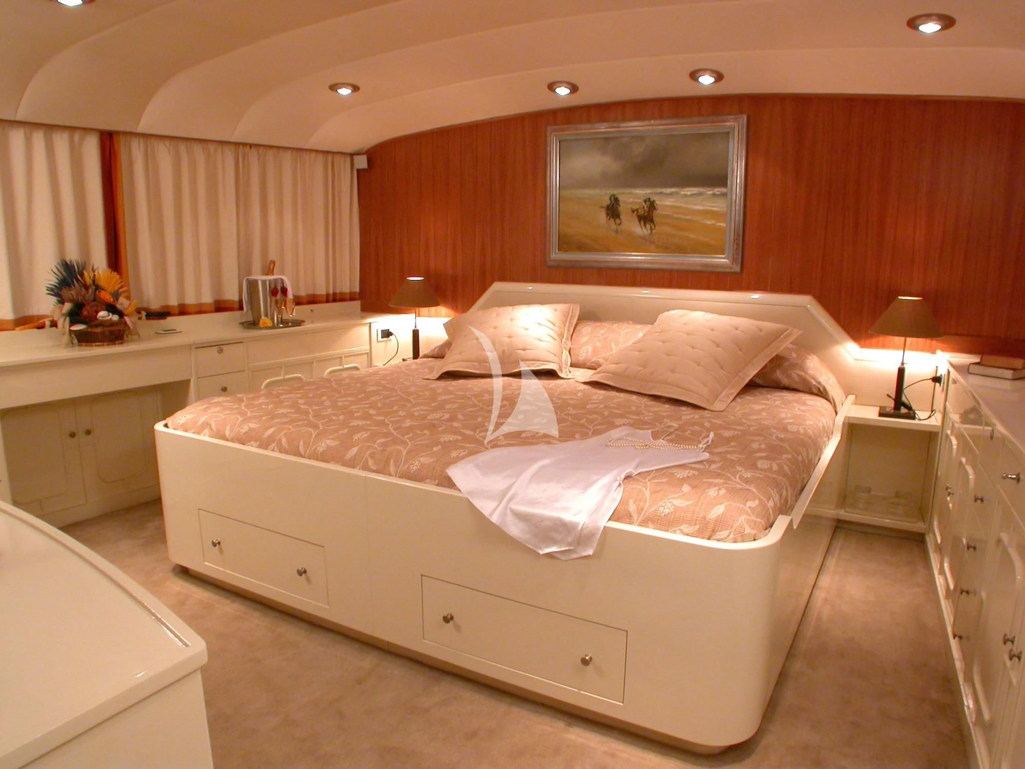 a large bed in a room aboard AVA Yacht for Charter