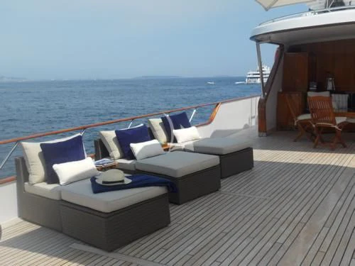 a large balcony overlooking the ocean aboard AVA Yacht for Charter