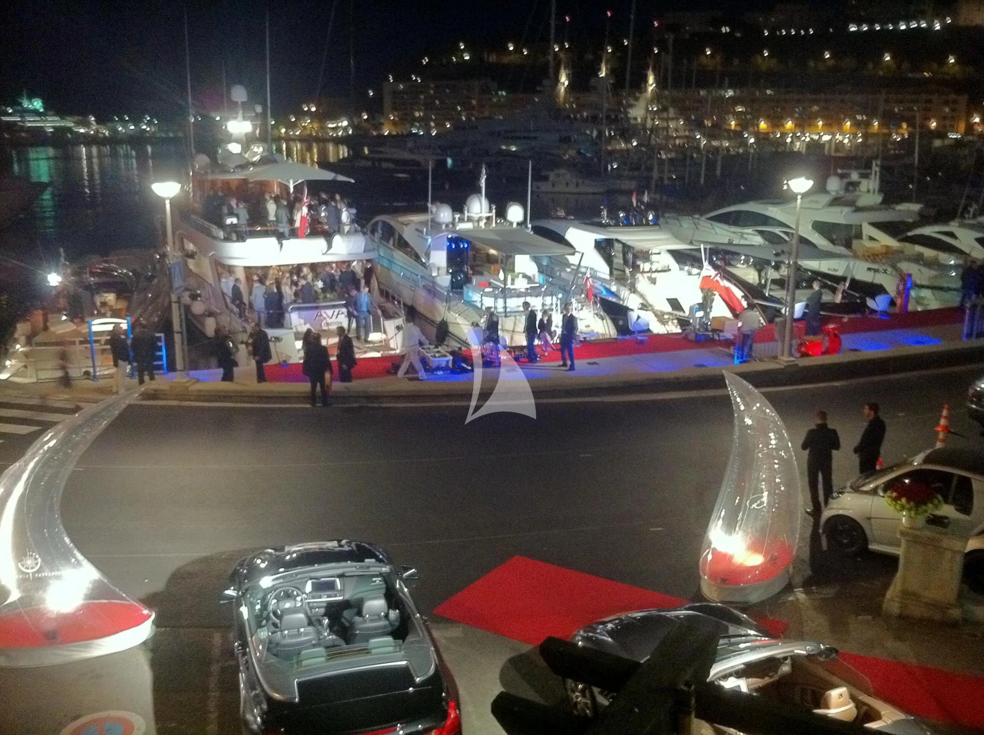 a large crowd of people at an event aboard AVA Yacht for Charter
