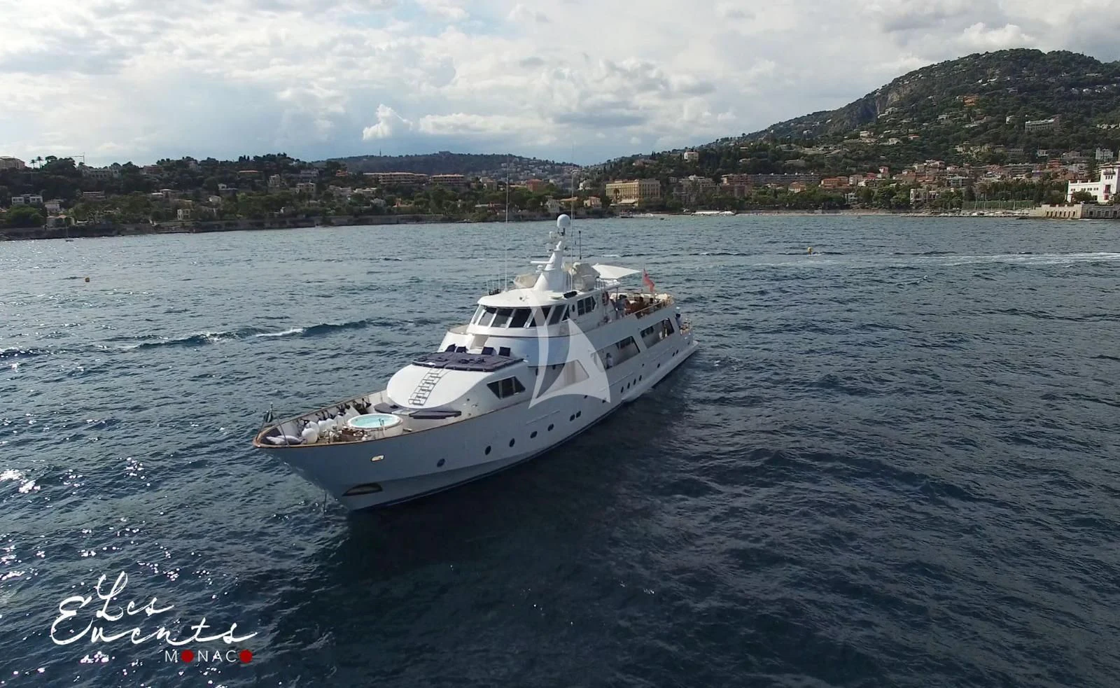 a white boat in the water aboard AVA Yacht for Charter