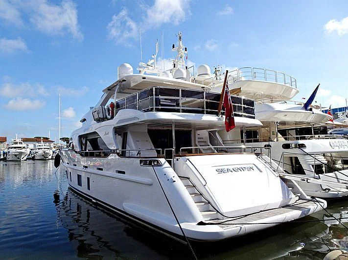 a large white boat in the water aboard SEA GYPSY Yacht for Sale