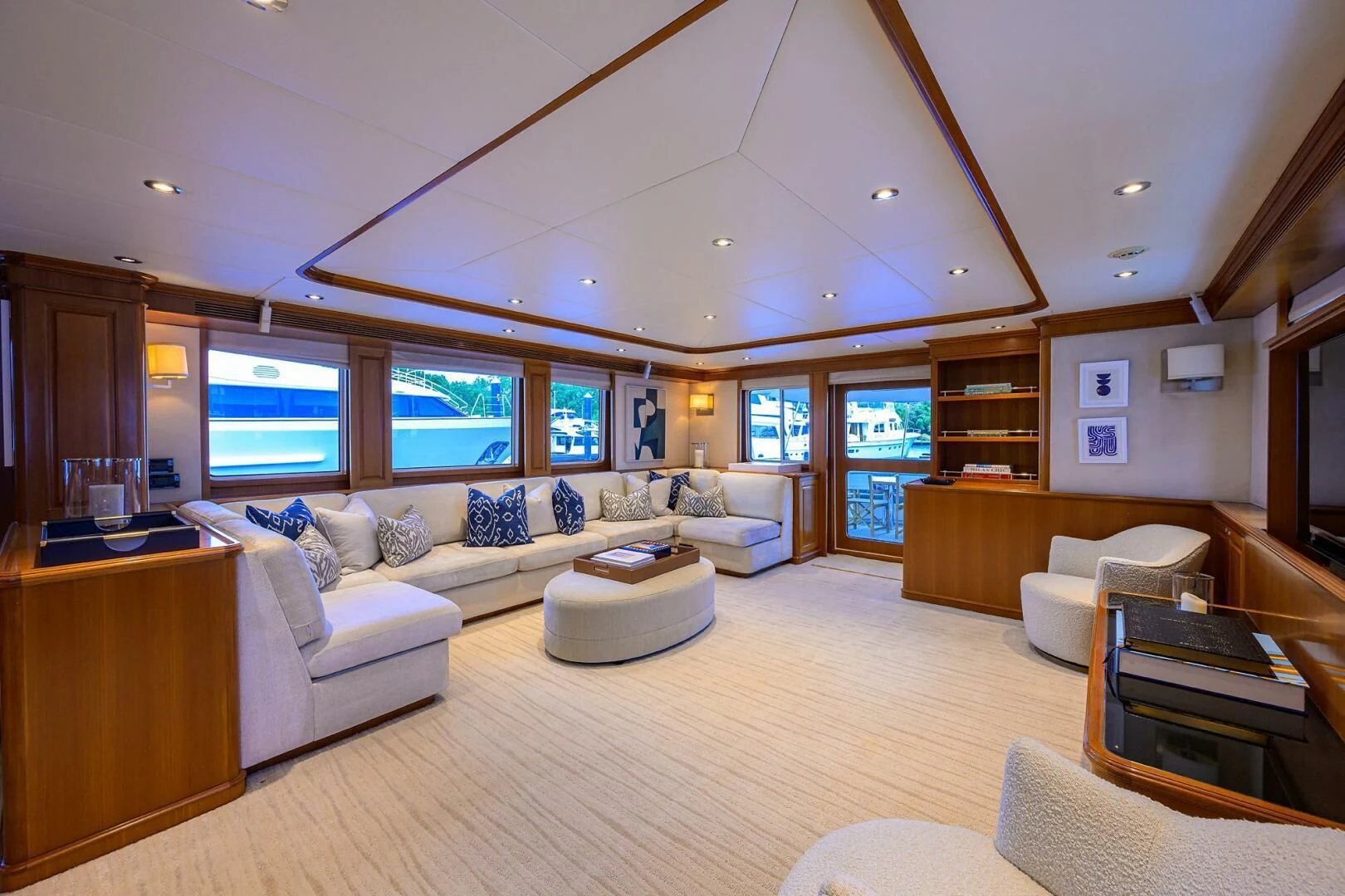 a living room with a large window aboard SOLACE Yacht for Sale