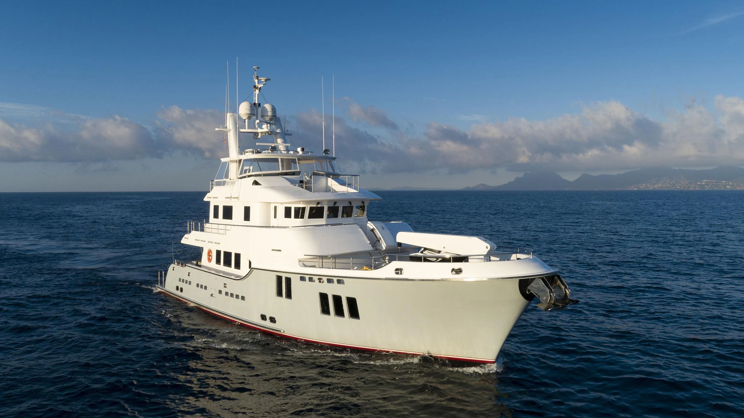 a white boat in the water aboard SOLACE Yacht for Sale
