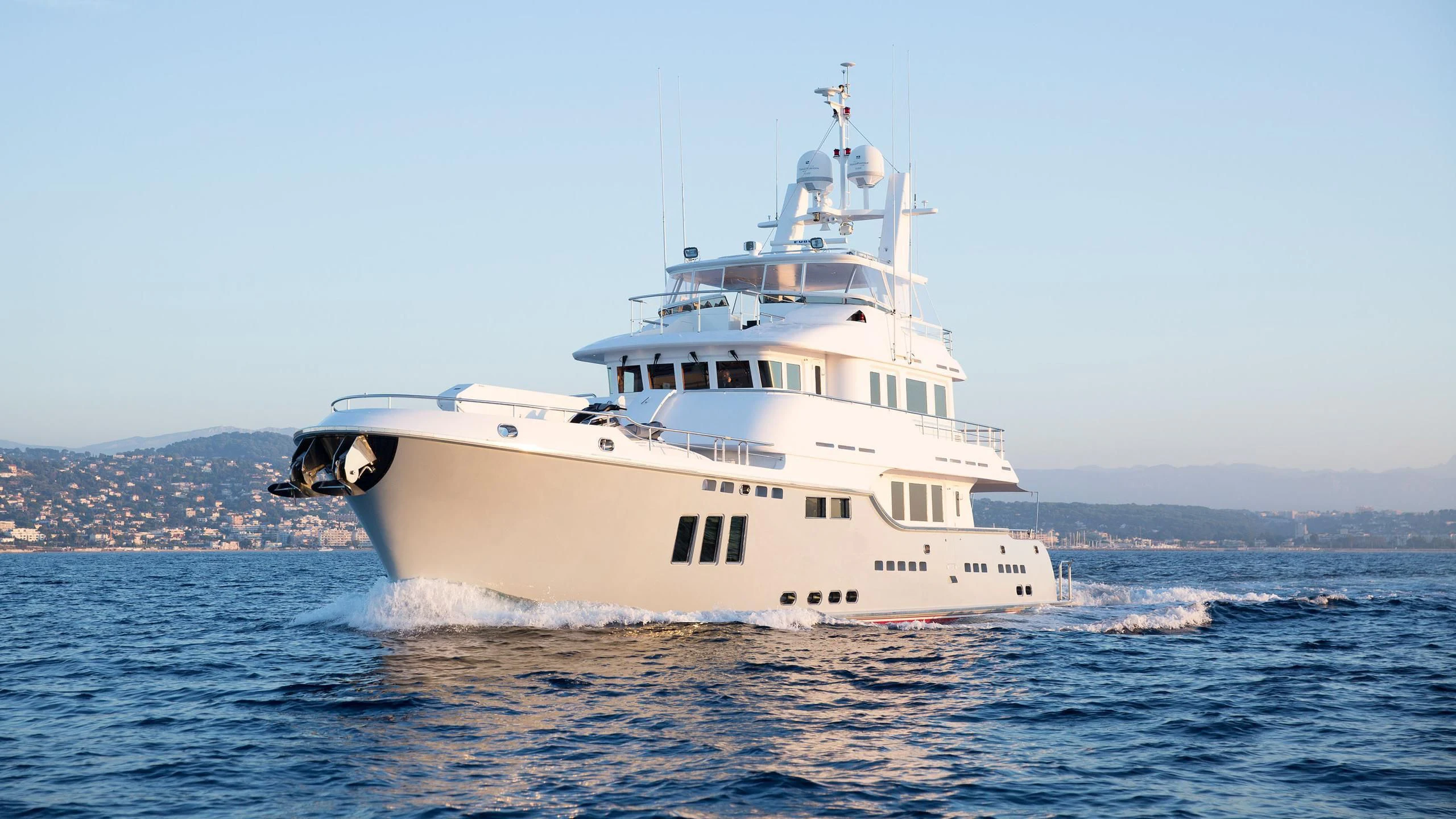 a large white ship in the water aboard SOLACE Yacht for Sale