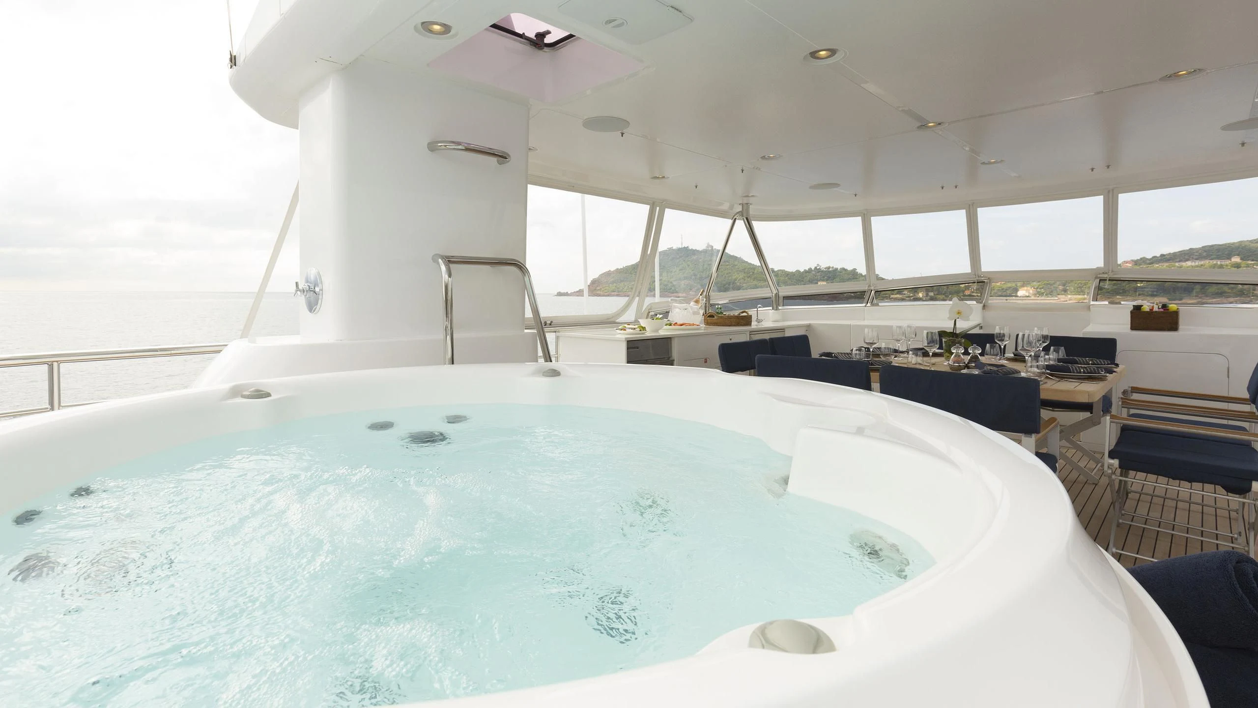 a large swimming pool aboard SOLACE Yacht for Sale