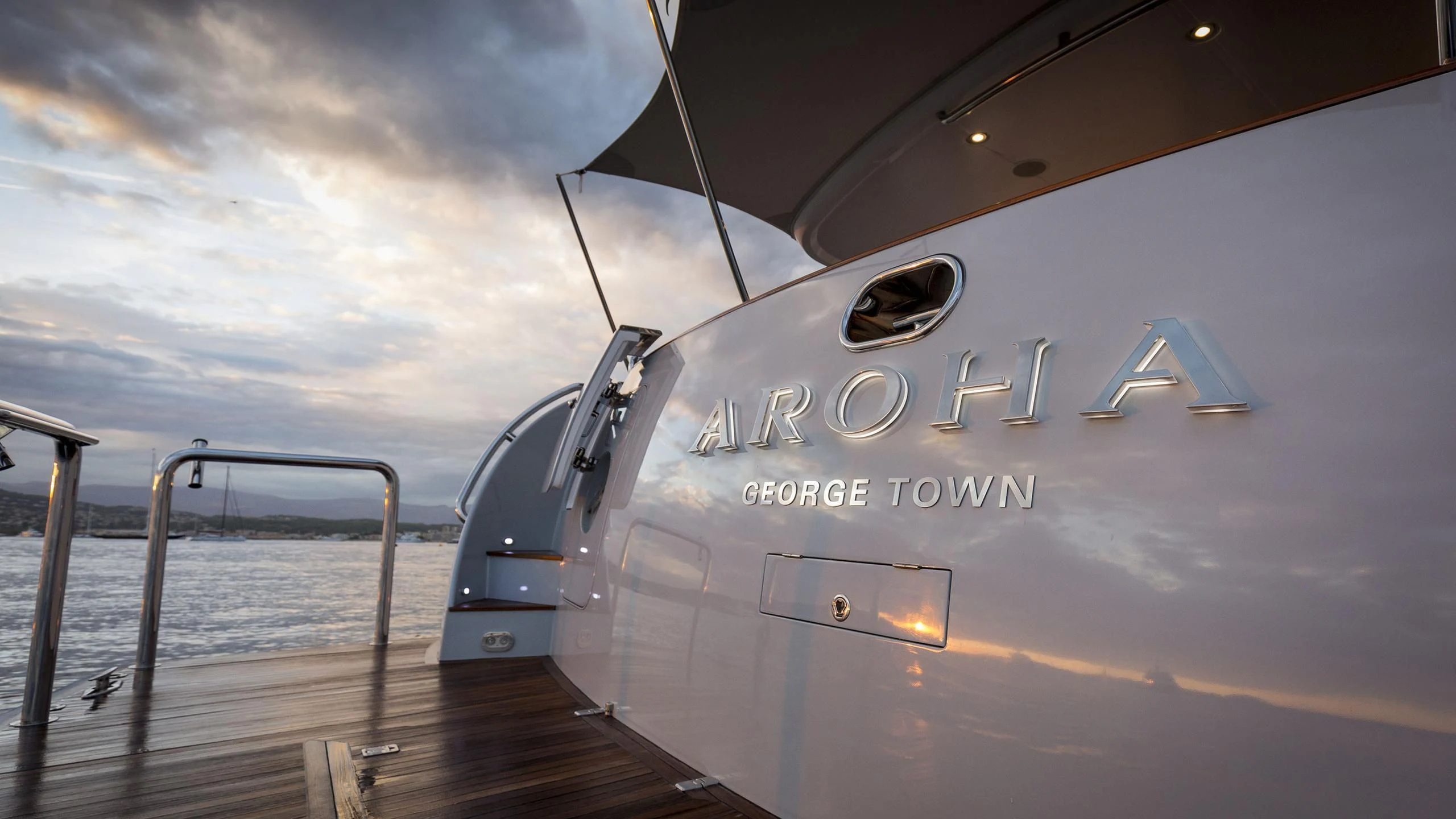a large silver airplane on a dock aboard SOLACE Yacht for Sale