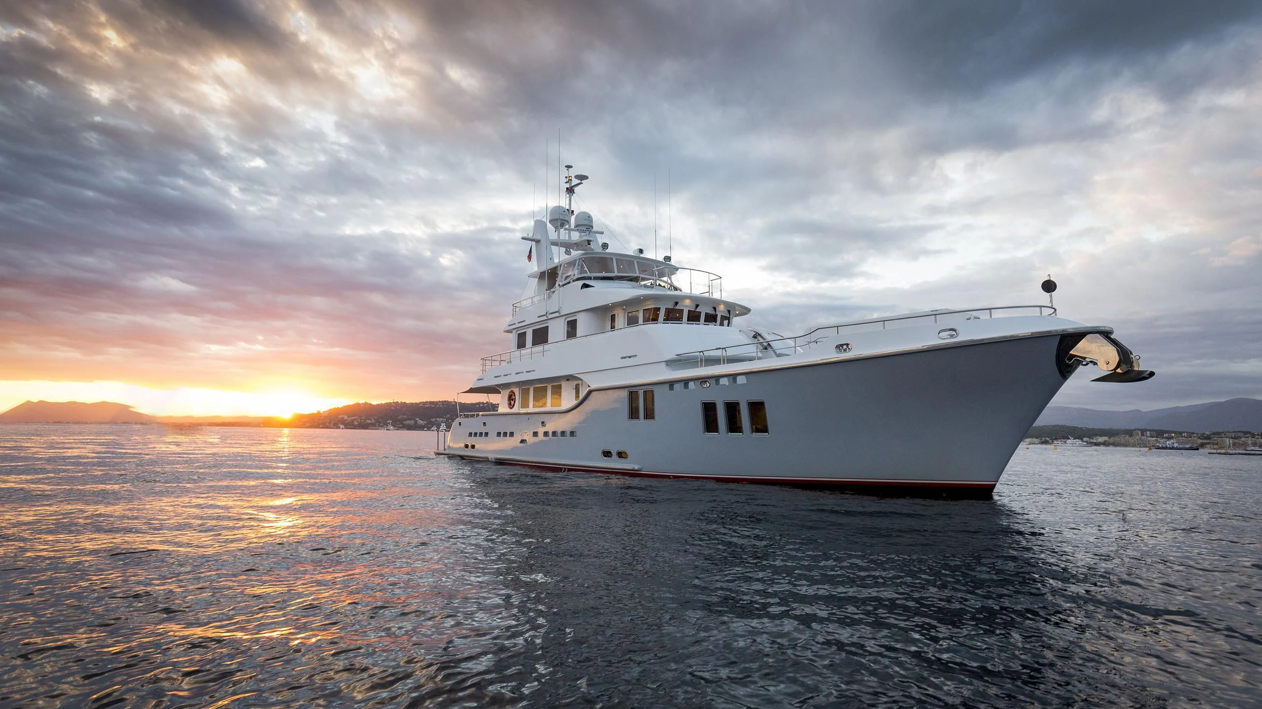 a large white ship in the water aboard SOLACE Yacht for Sale