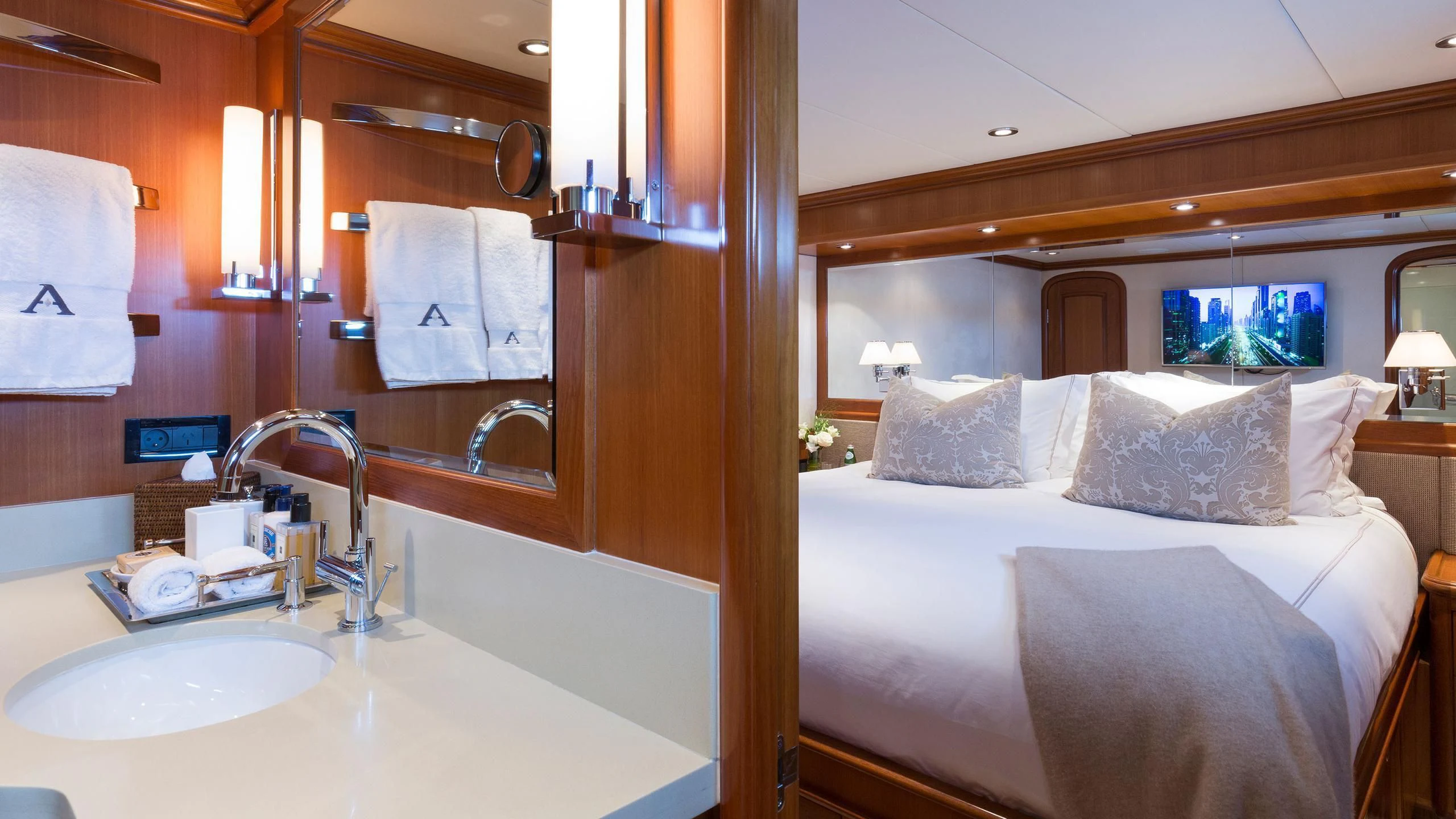 a hotel bathroom with a double bed aboard SOLACE Yacht for Sale