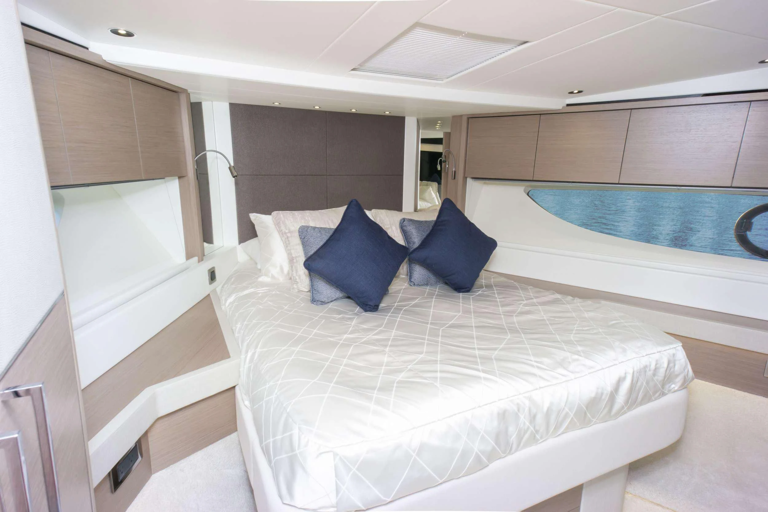 a bed in a room aboard MILAMO Yacht for Sale