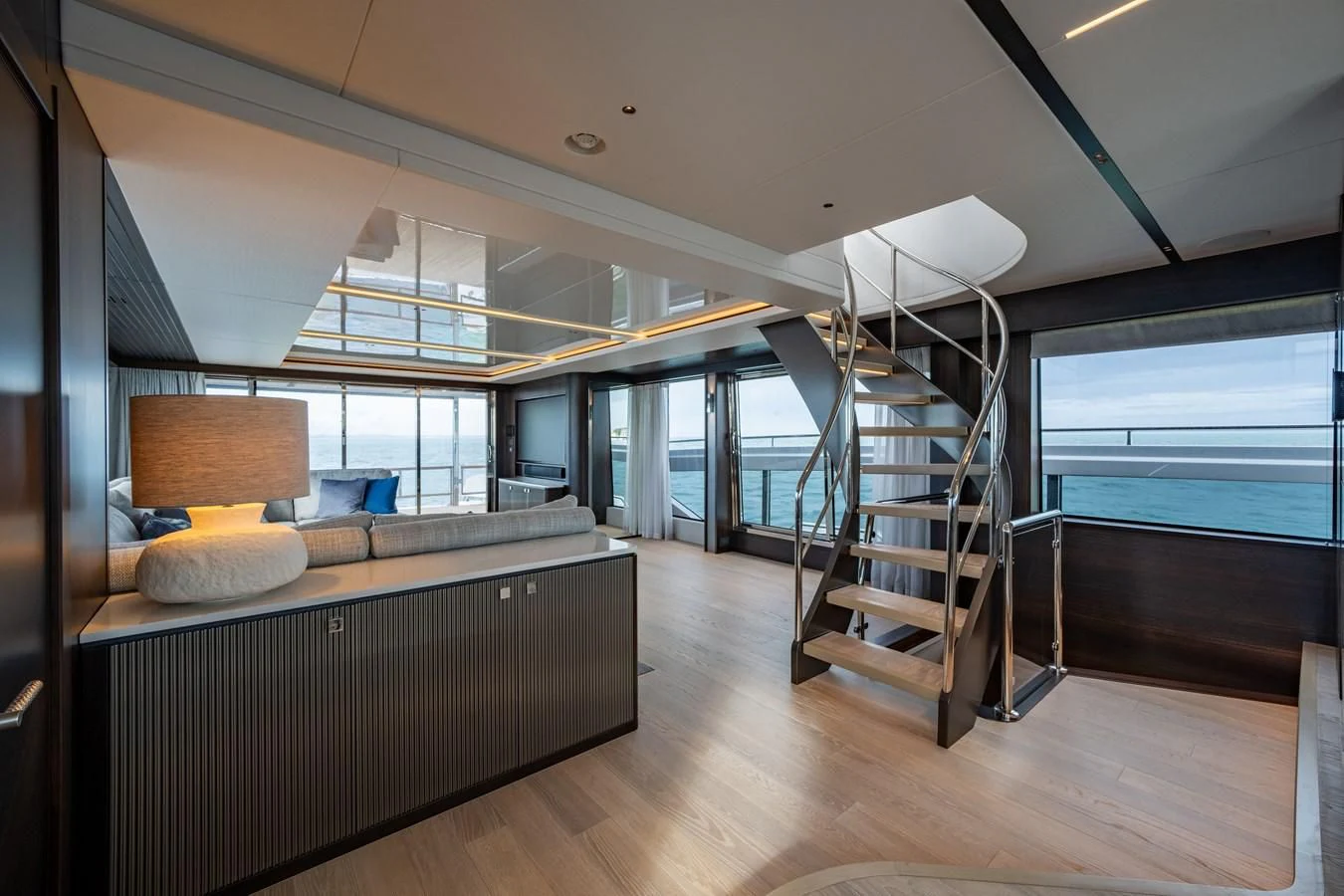 a modern looking bedroom with a large window aboard WORTH THE WAIT Yacht for Sale