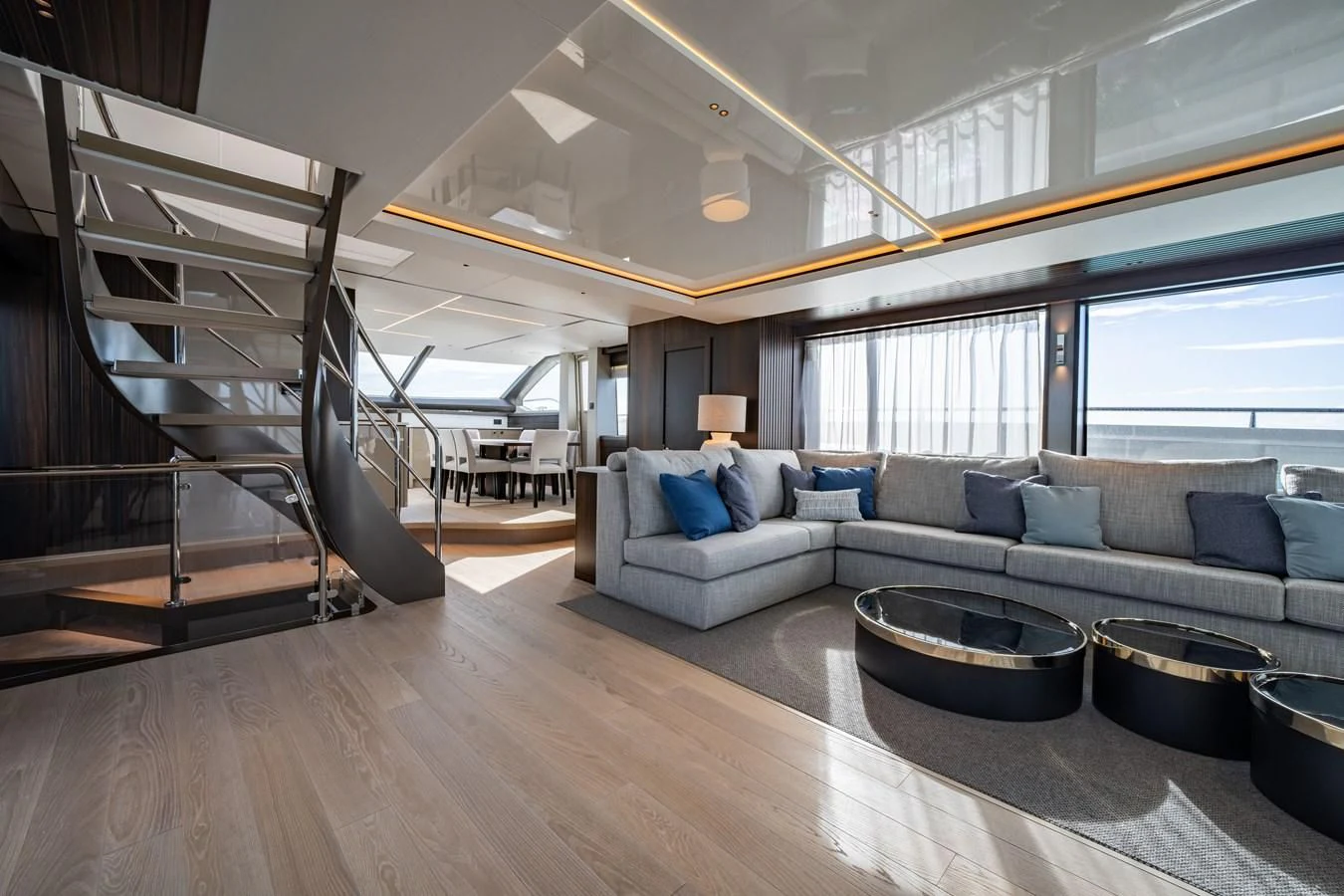 a living room with a staircase aboard WORTH THE WAIT Yacht for Sale