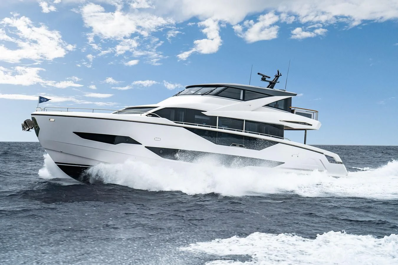 a white yacht on the water aboard WORTH THE WAIT Yacht for Sale