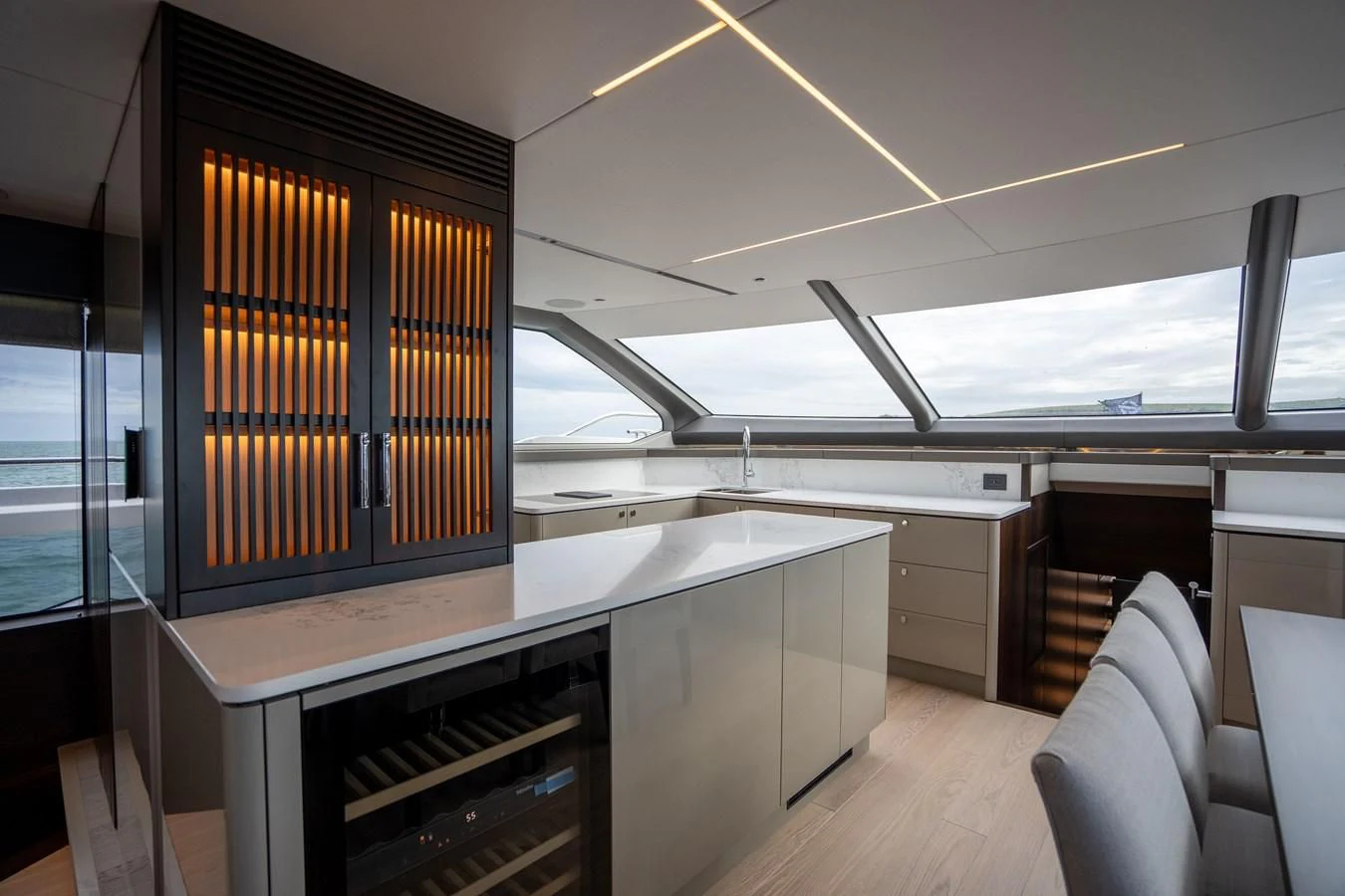 a room with a large window aboard WORTH THE WAIT Yacht for Sale