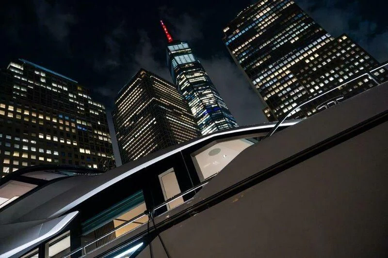 a city with skyscrapers and streets aboard WORTH THE WAIT Yacht for Sale