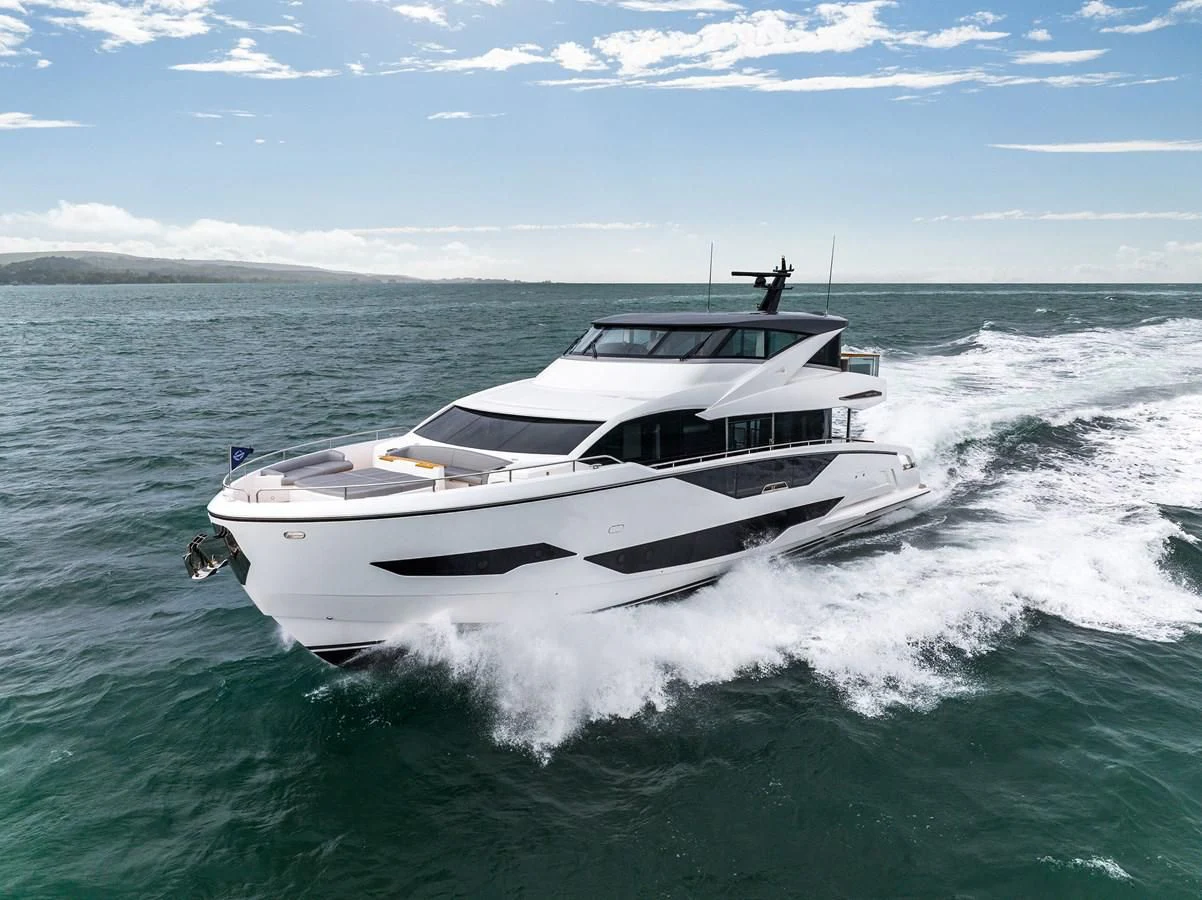 a white yacht on the water aboard WORTH THE WAIT Yacht for Sale